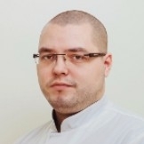 Сурагин Евгений Александрович, дерматолог